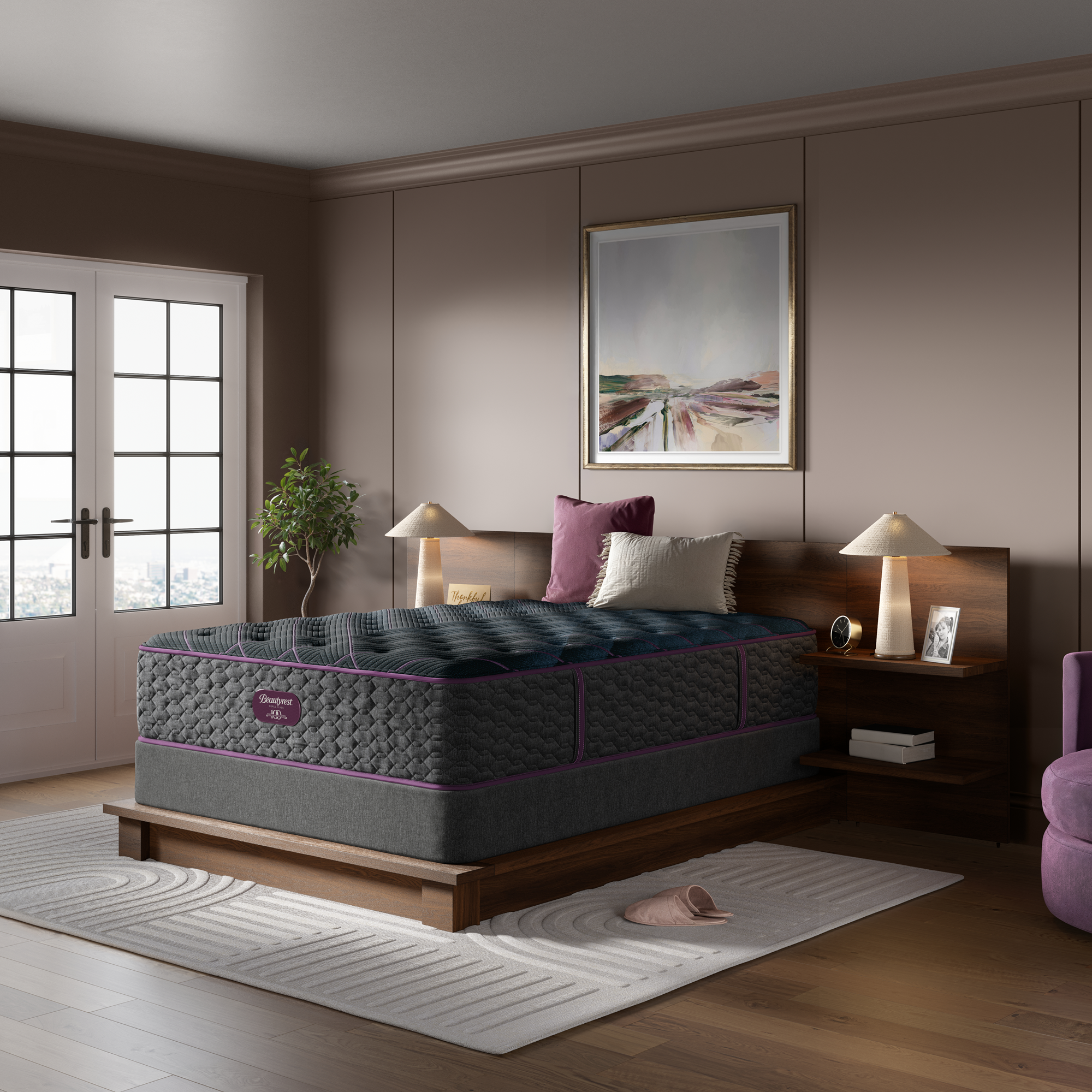 Beautyrest Mattress on a wooden bed frame in a bedroom setting with decor elements on top of a low profile 9" flat foundation