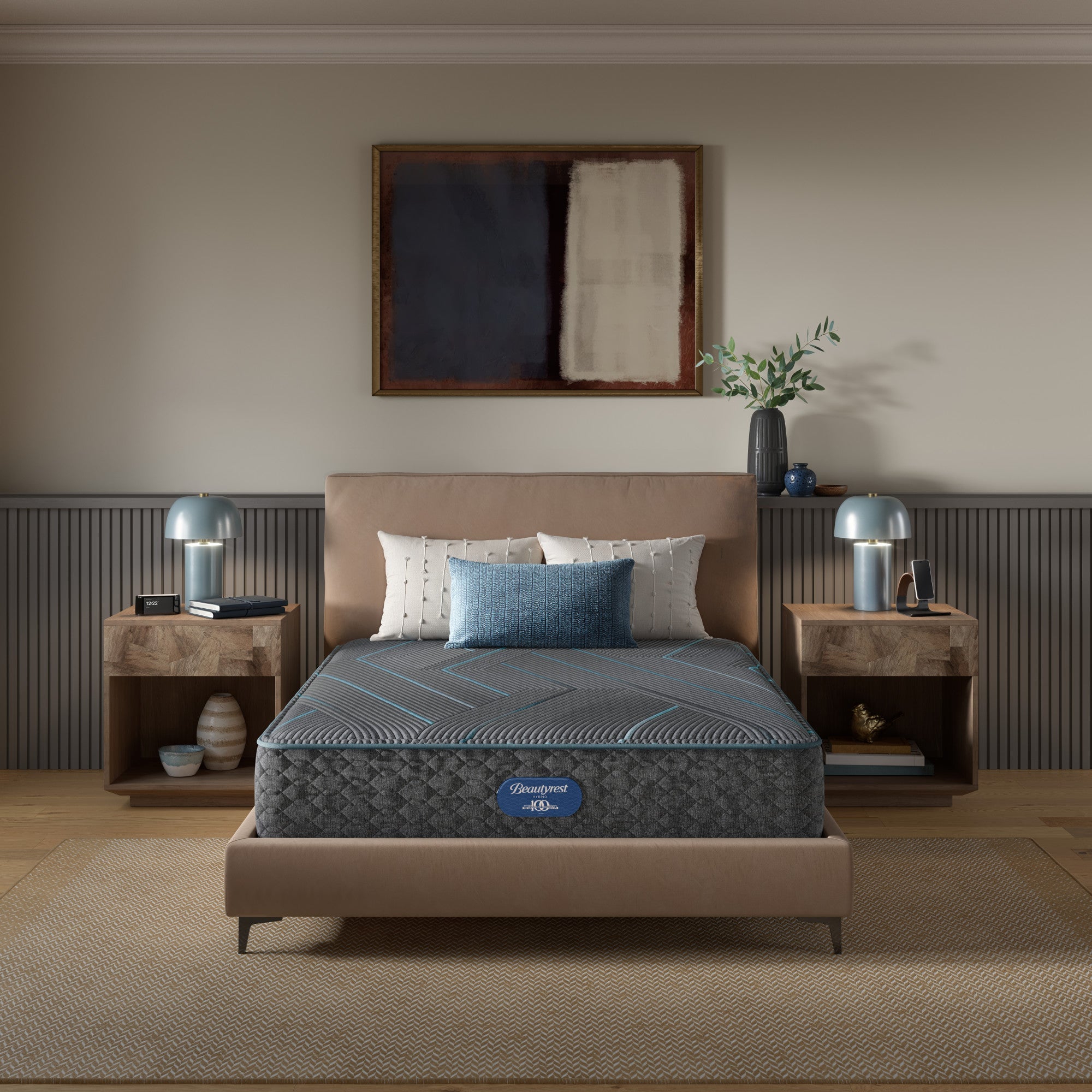 Beautyrest Hybrid Medium Firm Mattress mattress sitting in a beige bed frame with 3 pillows on top of it